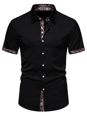 Black short sleeve buttoned shirt with paisley trim on collar, cuffs, and placket.