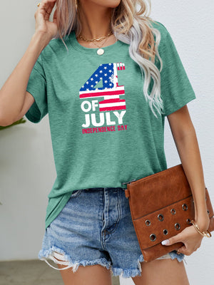 Green graphic t-shirt with 4th of July Independence Day print and crew neck.