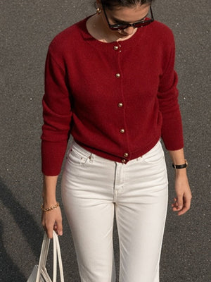cream cardigan with waist-length and button-front