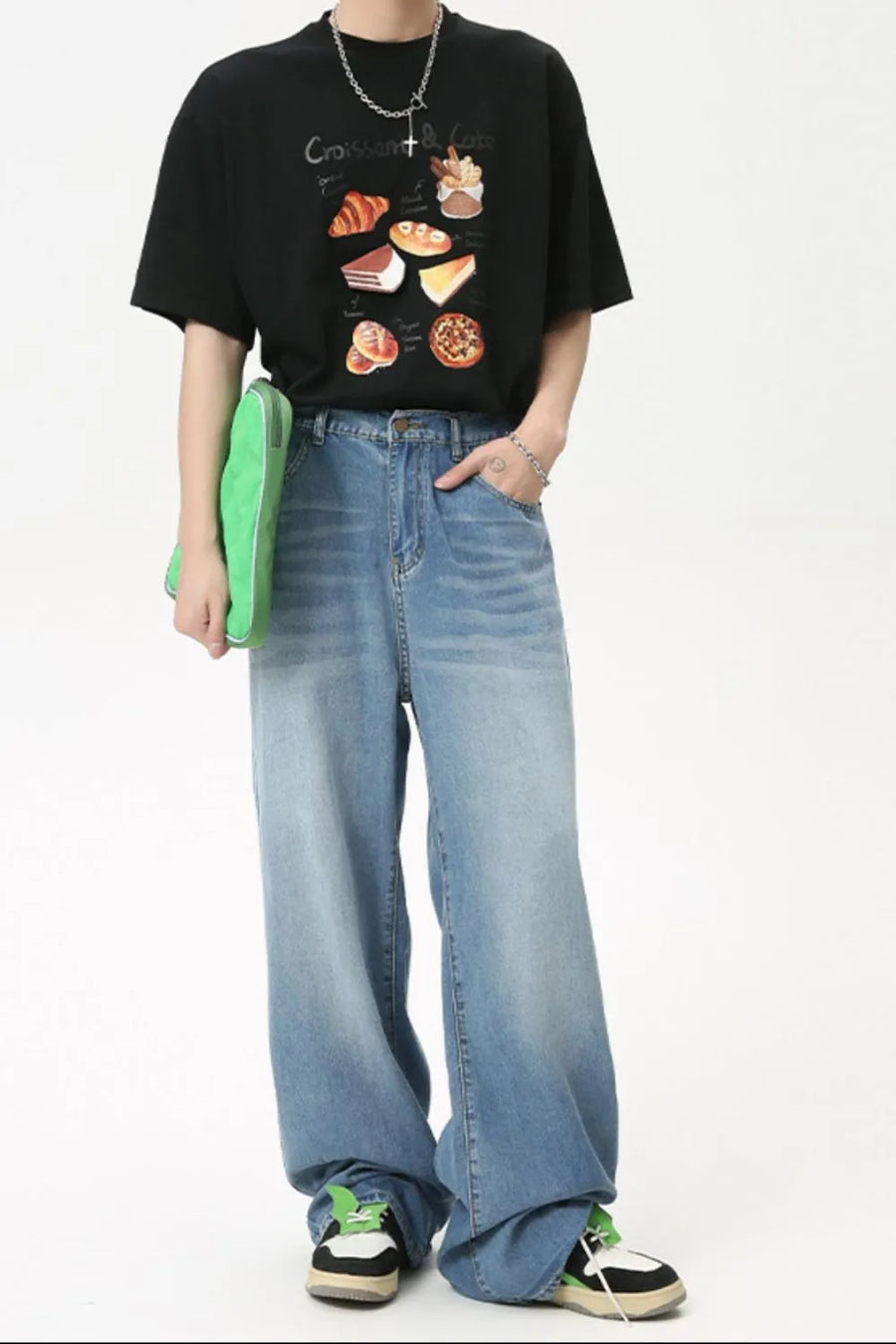 Oversized baggy denim jeans in medium wash, wide leg, casual style.