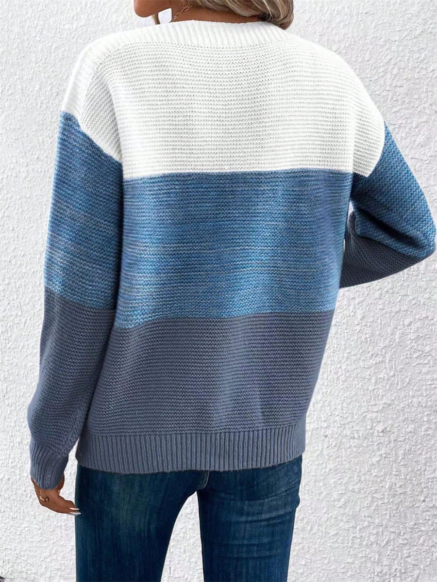 Colorblock boatneck knit sweater in white, blue, and gray acrylic with horizontal stripes.