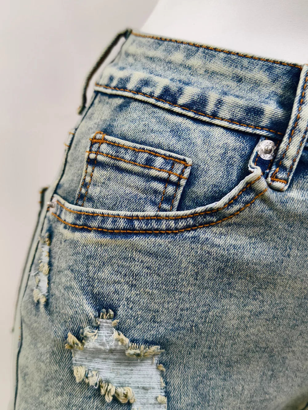 95% polyester, 5% elastane Care instructions: Machine wash cold denim shorts in medium blue with regular silhouette
