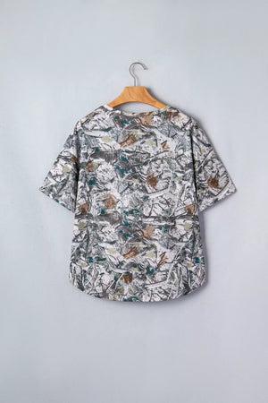 Earthy camouflage print henley t-shirt with short sleeves and a buttoned neckline.
