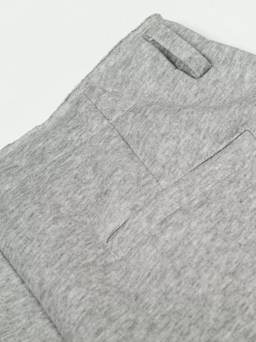 Gray men's sweatpants with wide legs and a back pocket detail.