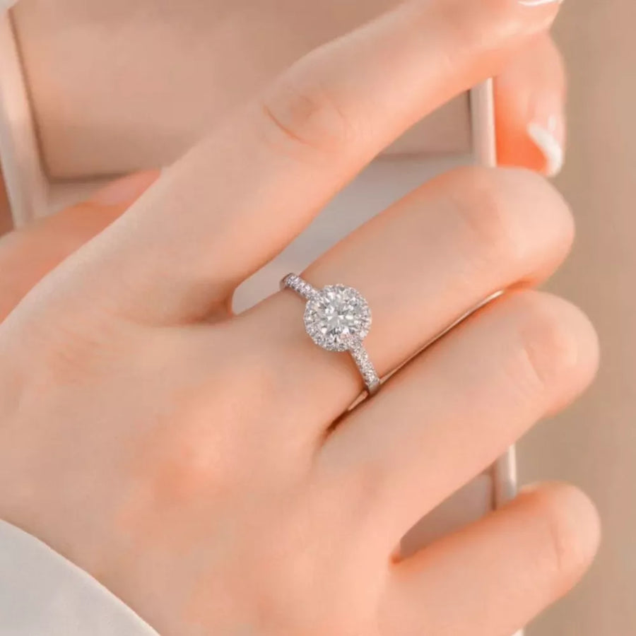 925 sterling silver,Moissanite Carat weight: 2ct Care instructions: Avoid wearin ring in clear with straight silhouette