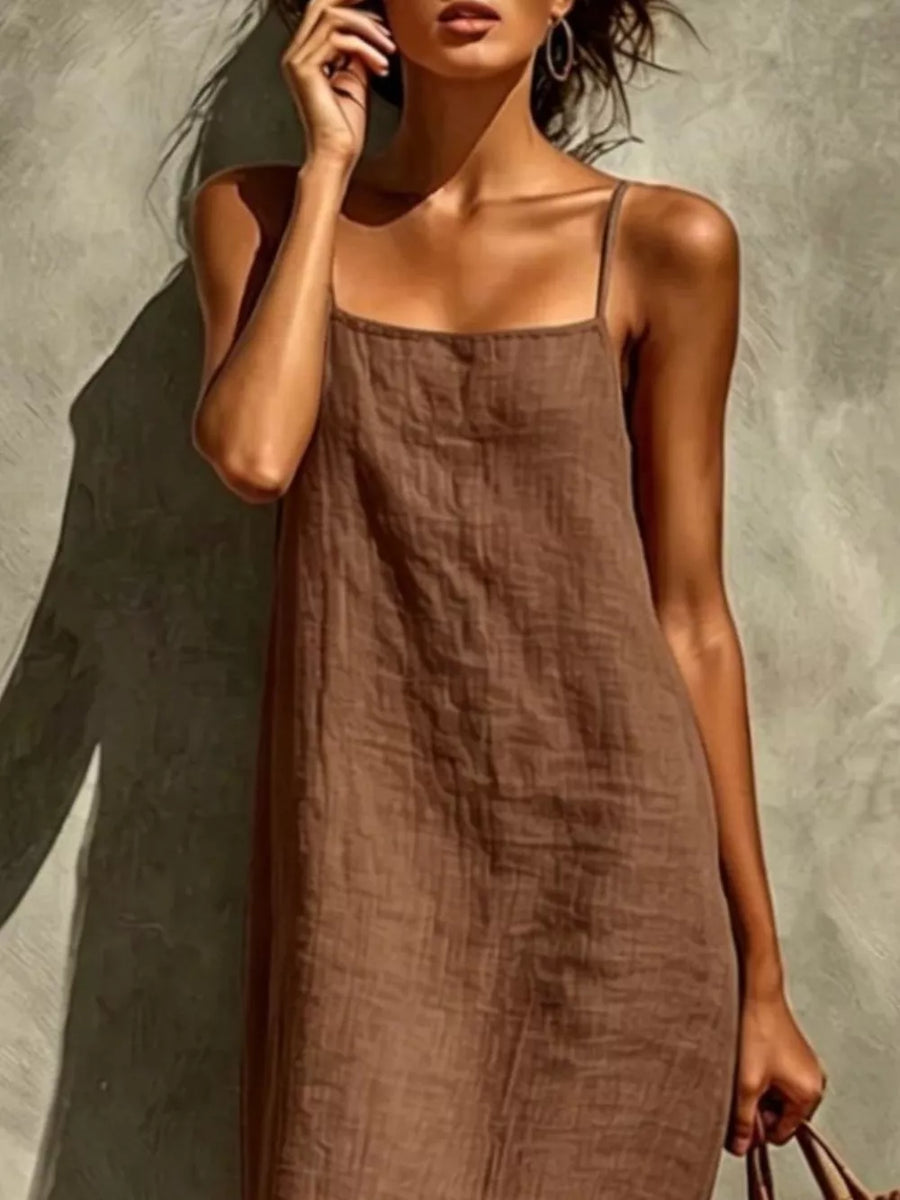 Taupe linen-blend maxi dress with spaghetti straps and square neckline.