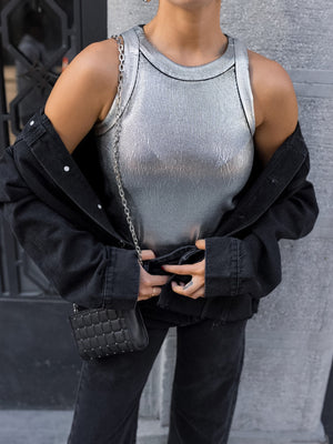 Silver ribbed knit tank top with black denim jacket
