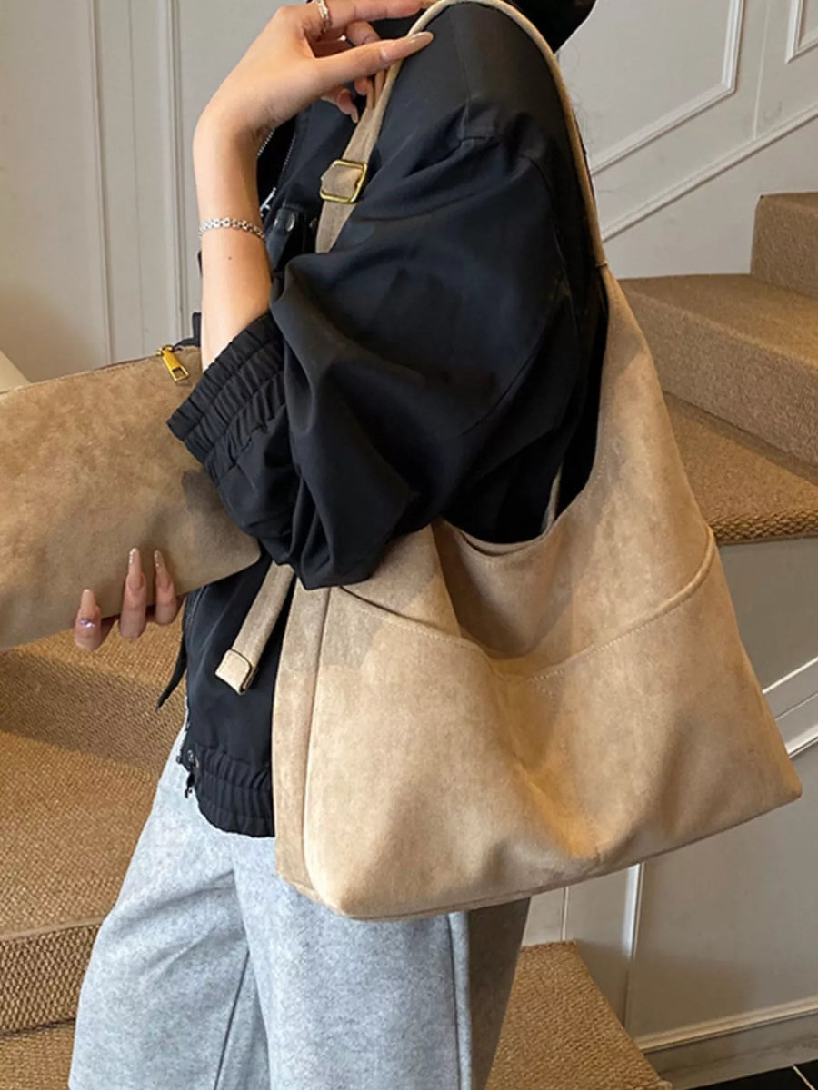 Large Khaki Suede Shoulder Bag with exterior pockets and a matching clutch.