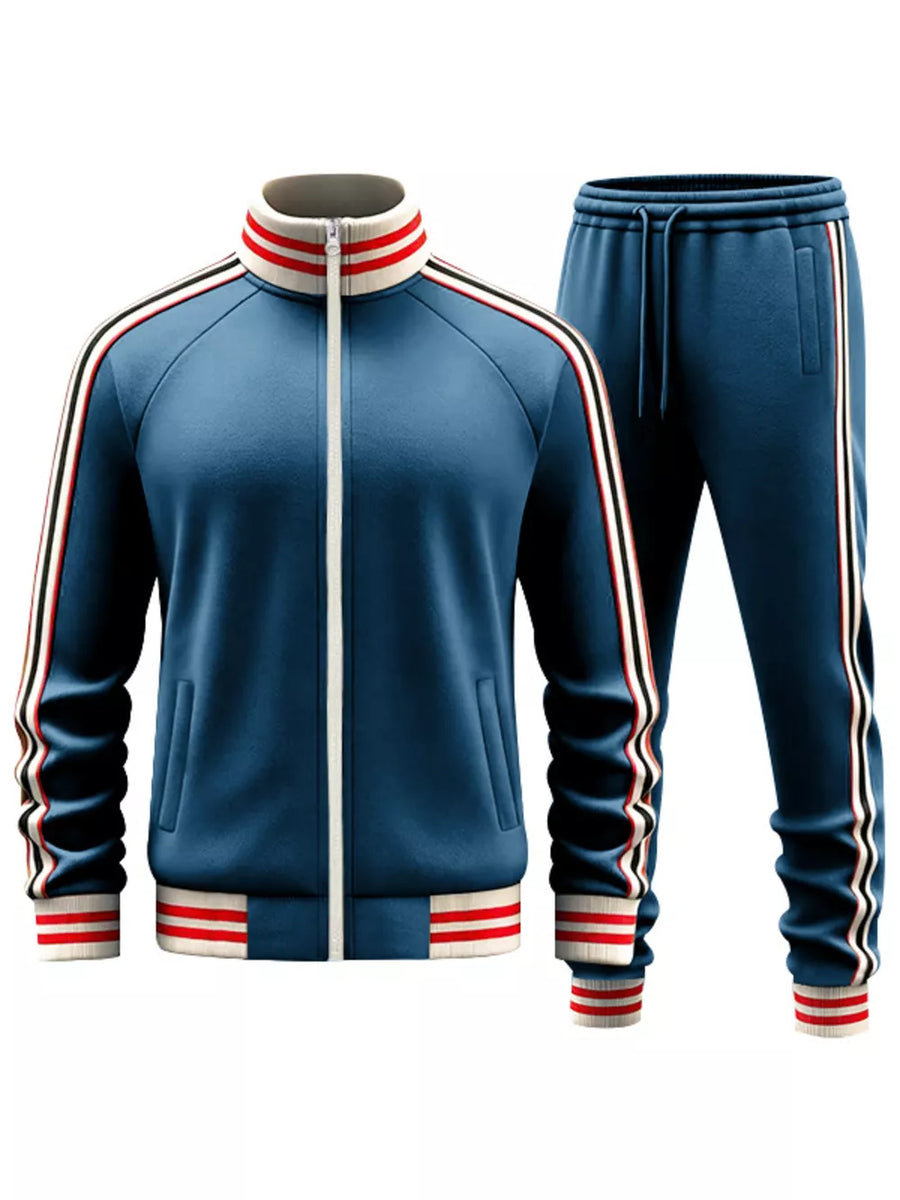 French blue tracksuit with white, red, and black stripe accents on collar, sleeves, and pant legs.