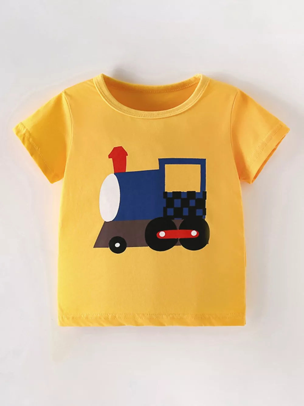 Yellow cotton t-shirt for kids with a playful cartoon train graphic and checkered detail.