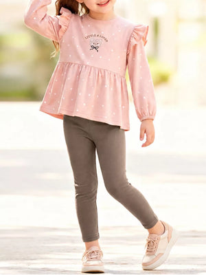 blush pink peplum top with polka dot and round neck