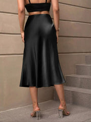 Black satin high-waisted midi skirt with a flowing A-line cut.