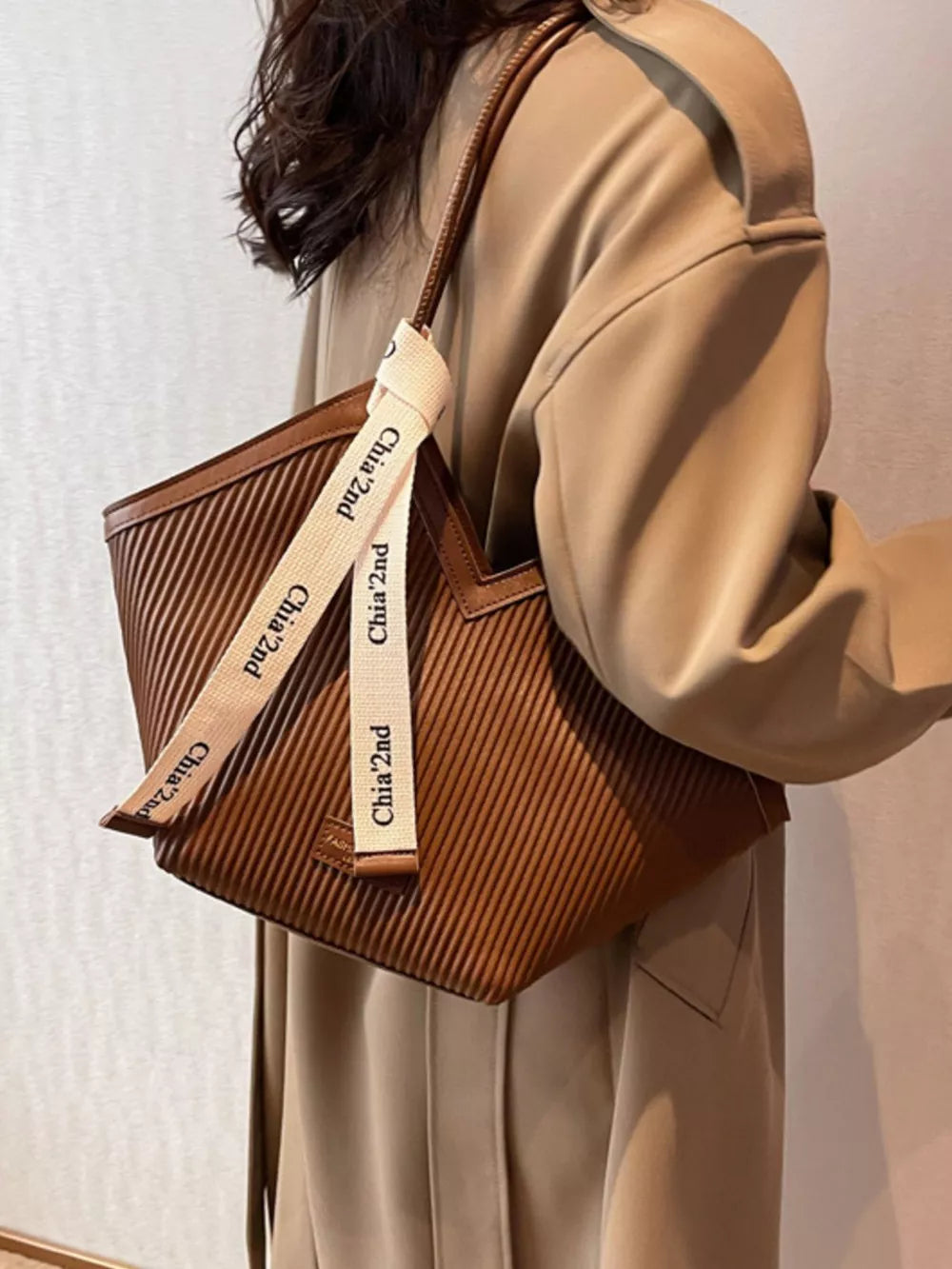 Brown ribbed texture large shoulder bag with white logo strap detail