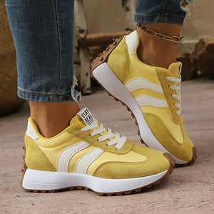 mustard yellow sneakers with lace-up and striped