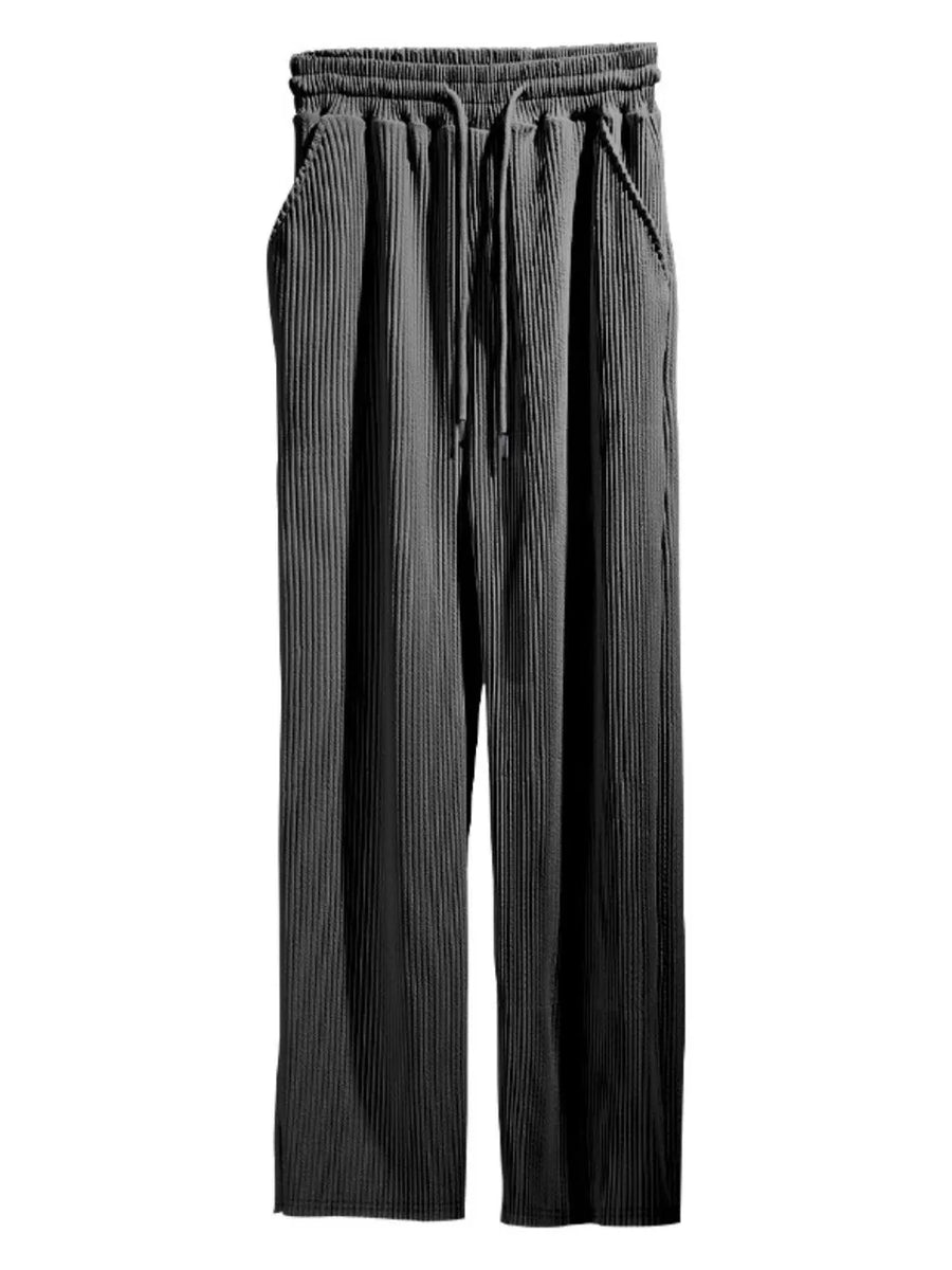Textured wide-leg drawstring lounge trousers in dark gray with pockets.