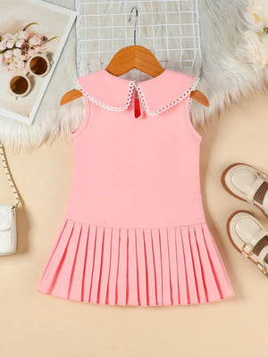 Pink toddler dress with lace collar and pleated skirt