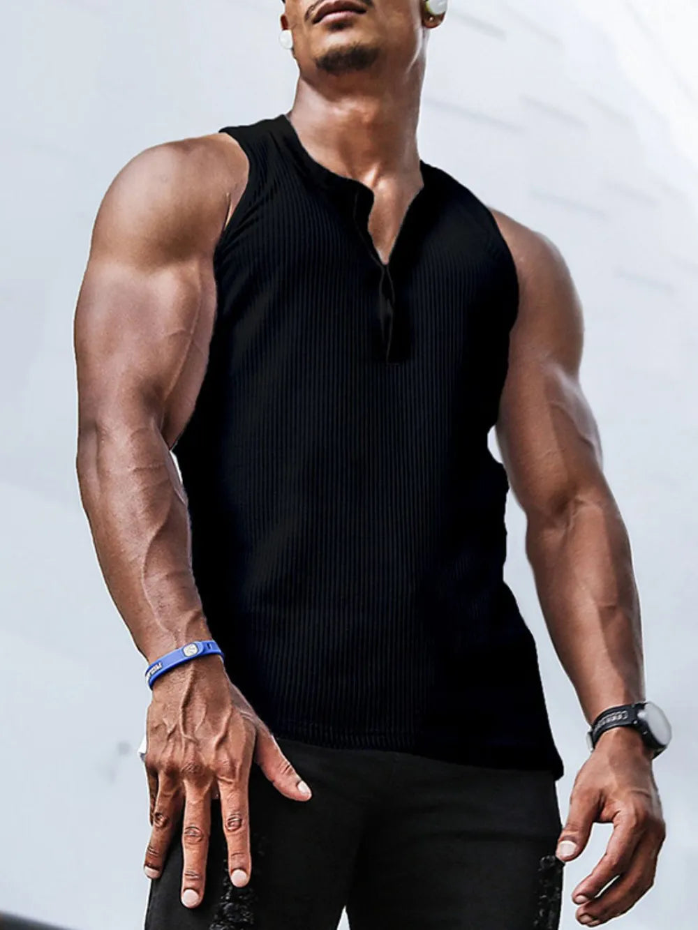 Black ribbed henley muscle tank with button detail and a v-neck