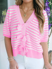 Pink and white striped knit V-neck cardigan with bow knot detail