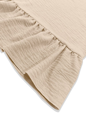 Beige mini dress with ruffled hem detail and textured fabric.