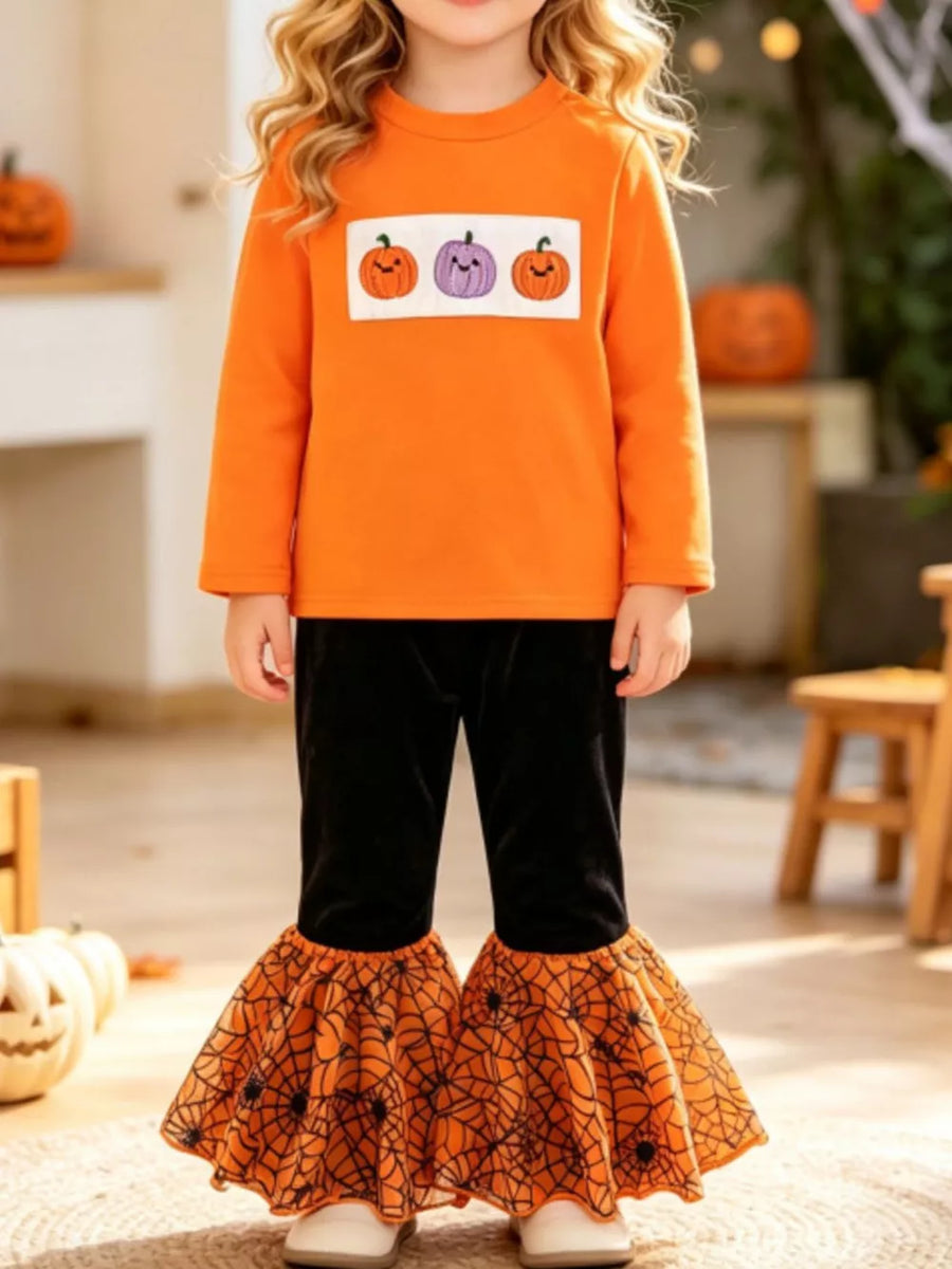 orange pajama set with pumpkin embroidery, spiderweb print and crew neck