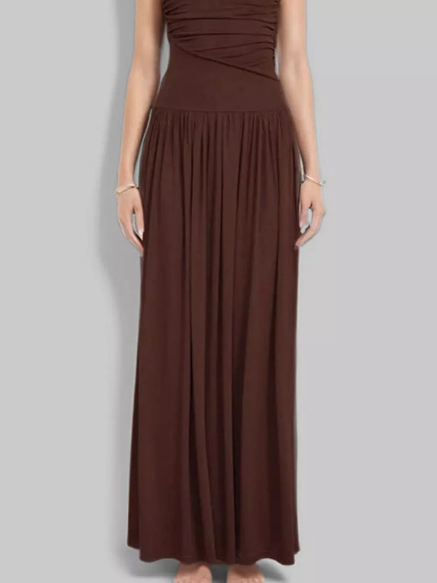 Brown ruched maxi dress with gathered neckline and flowing skirt