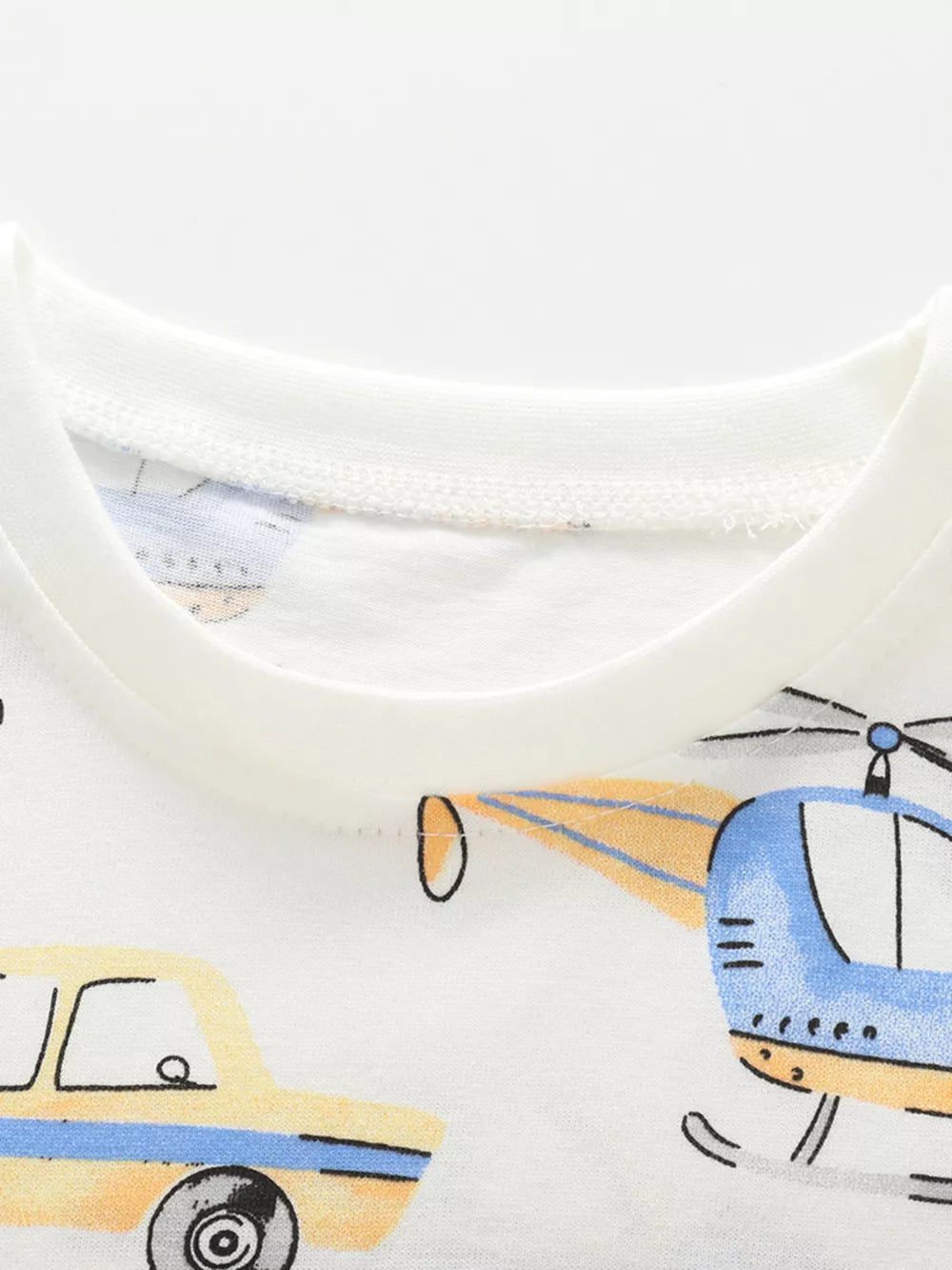 White cotton toddler t-shirt with blue helicopter and yellow car print
