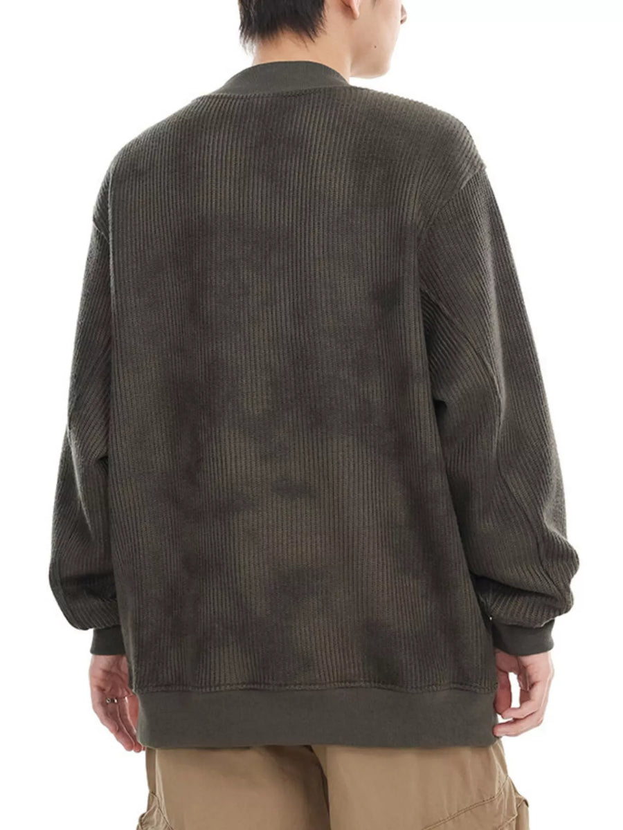 Oversized dark gray corduroy sweatshirt with a tie-dye effect and ribbed crew neck.