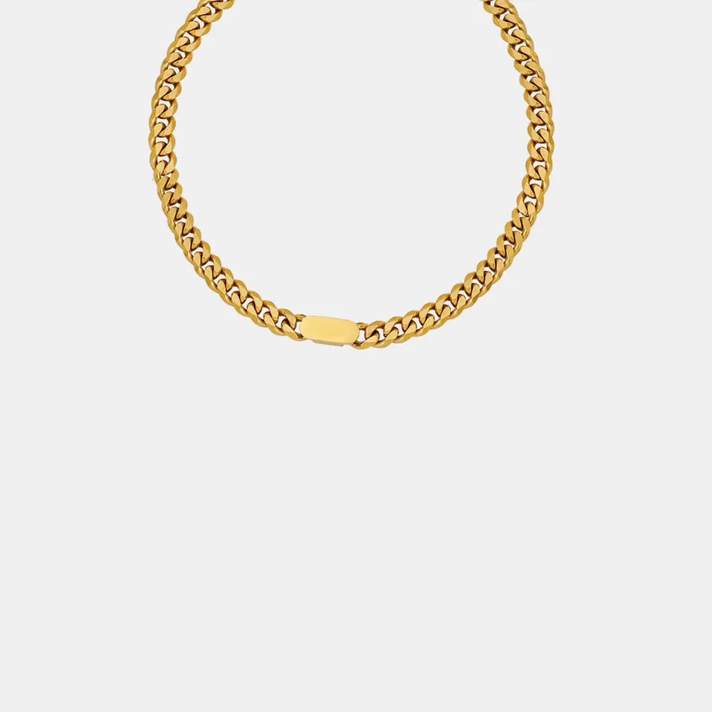 Gold Cuban link chain necklace with a flat clasp