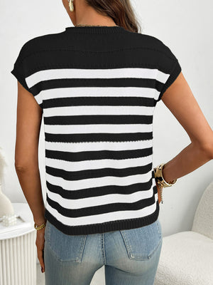 Black and white striped knit sweater with short sleeves and a mock neck.