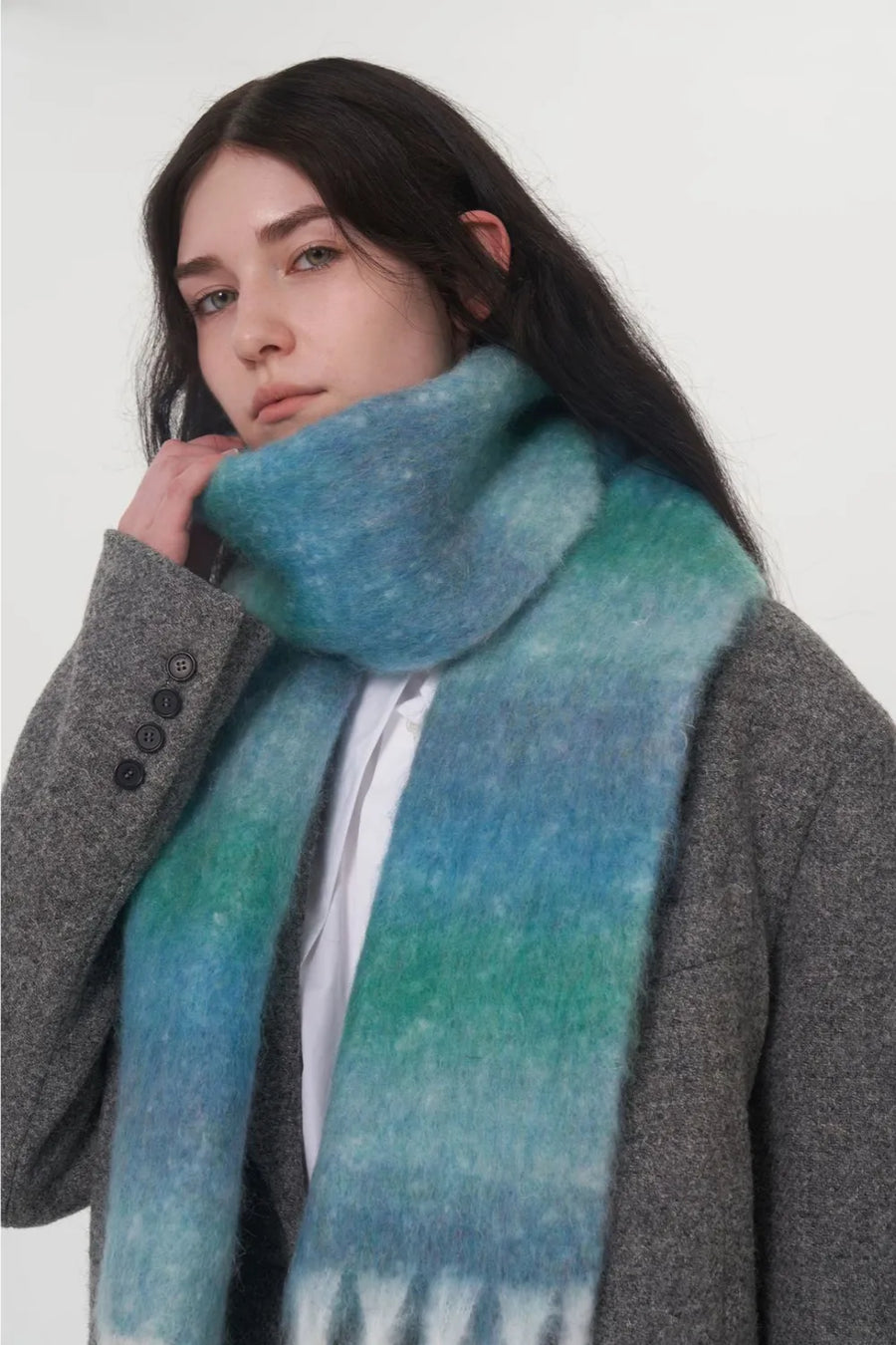Gradient mohair scarf in sky blue and gum leaf with fringe detail.