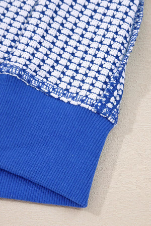 sweatshirt featuring waffle-knit in royal blue with 75% cotton, 25% polyester Care instructions: Machine wash cold texture