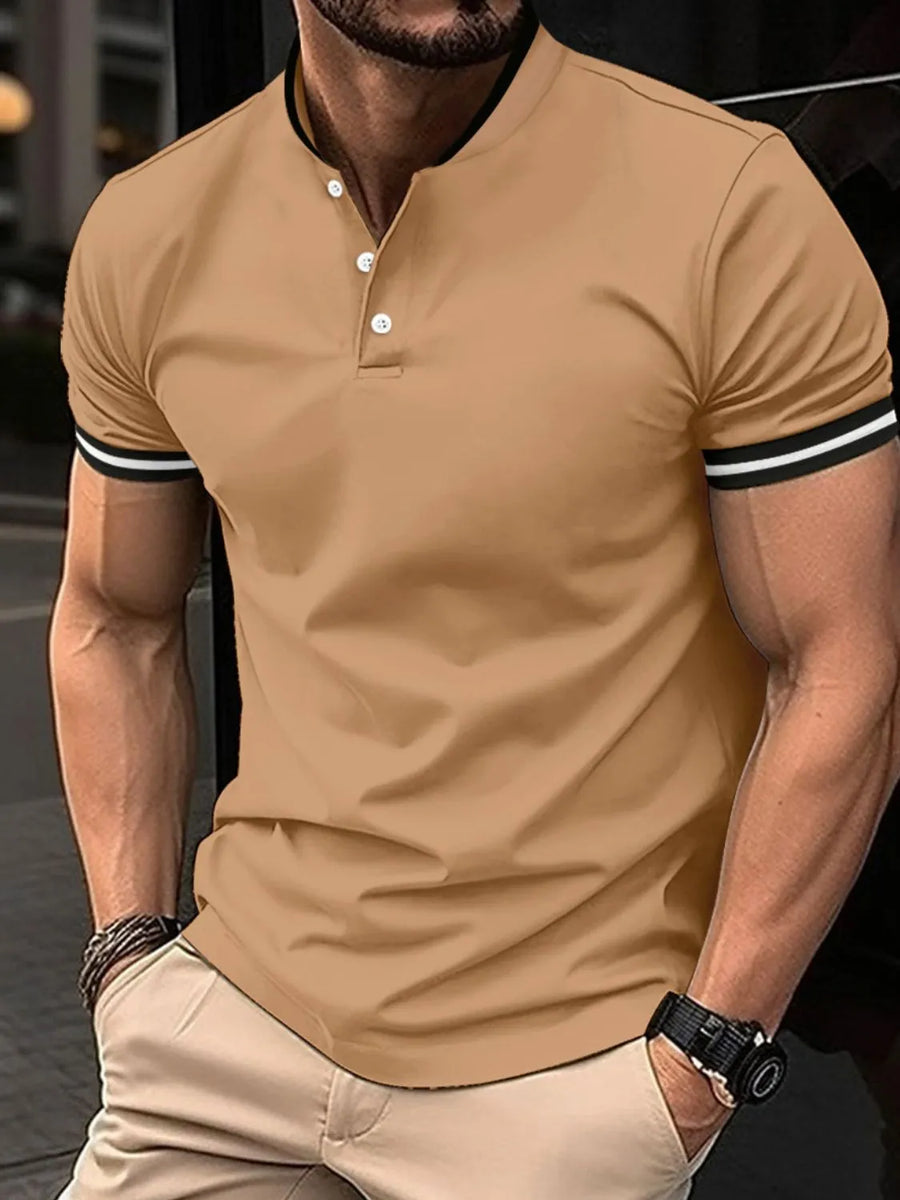 Camel mandarin collar polo shirt with contrast trim on sleeves and neckline.