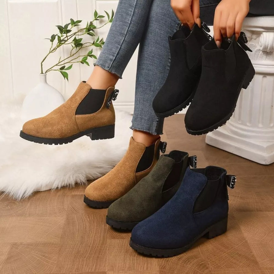 boots in black featuring round toe and ankle boot fit