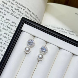 earrings in silver featuring zircon embellishment and drop fit