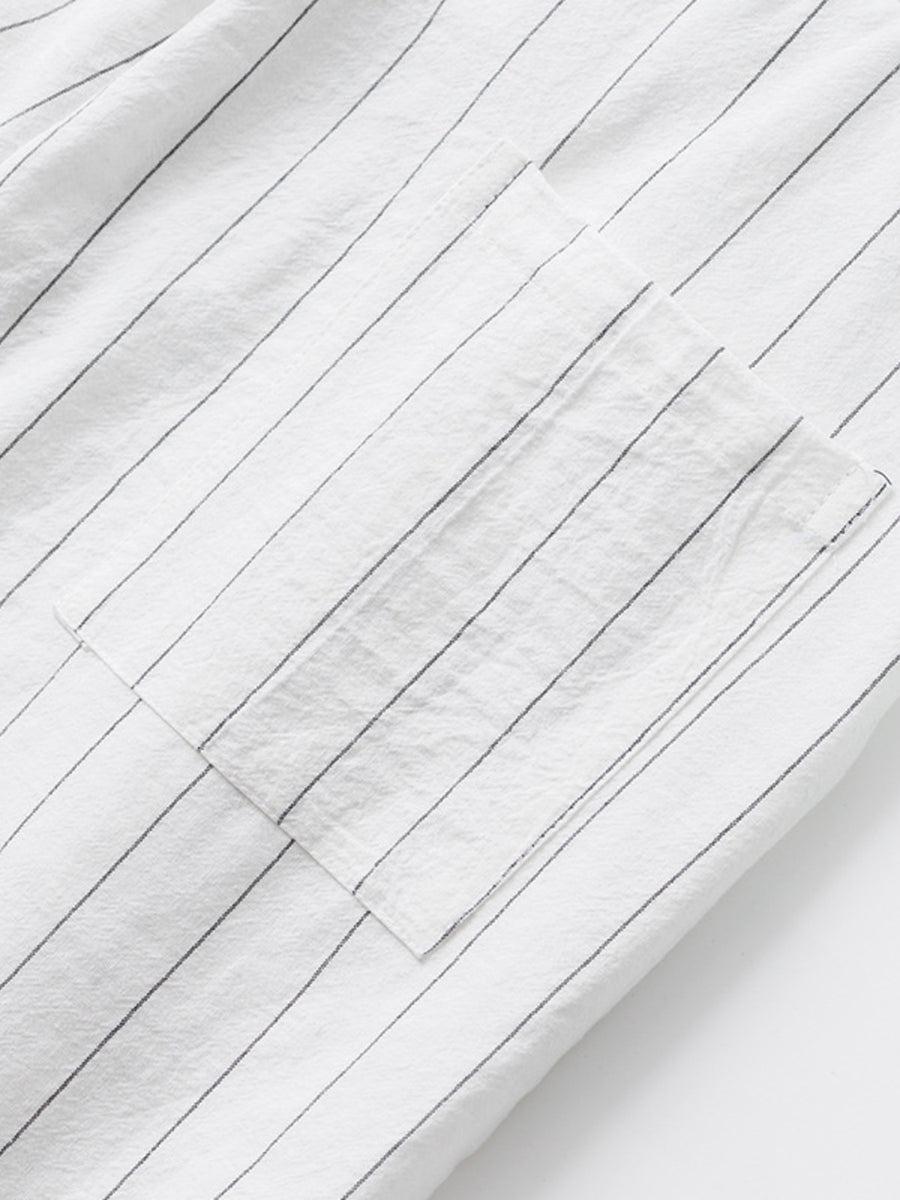 White striped sweatpants with a pocket detail.