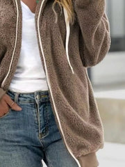 Cozy fleece zip-up hooded jacket in brown with white zipper and drawstring.