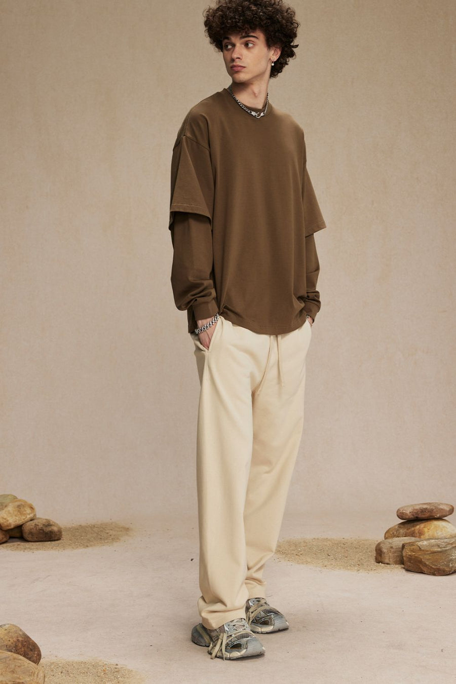 Brown layered long sleeve t-shirt with cream drawstring pants