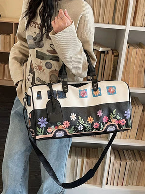 Flower Power Large Duffel Bag in black and white with colorful floral and camper van print.