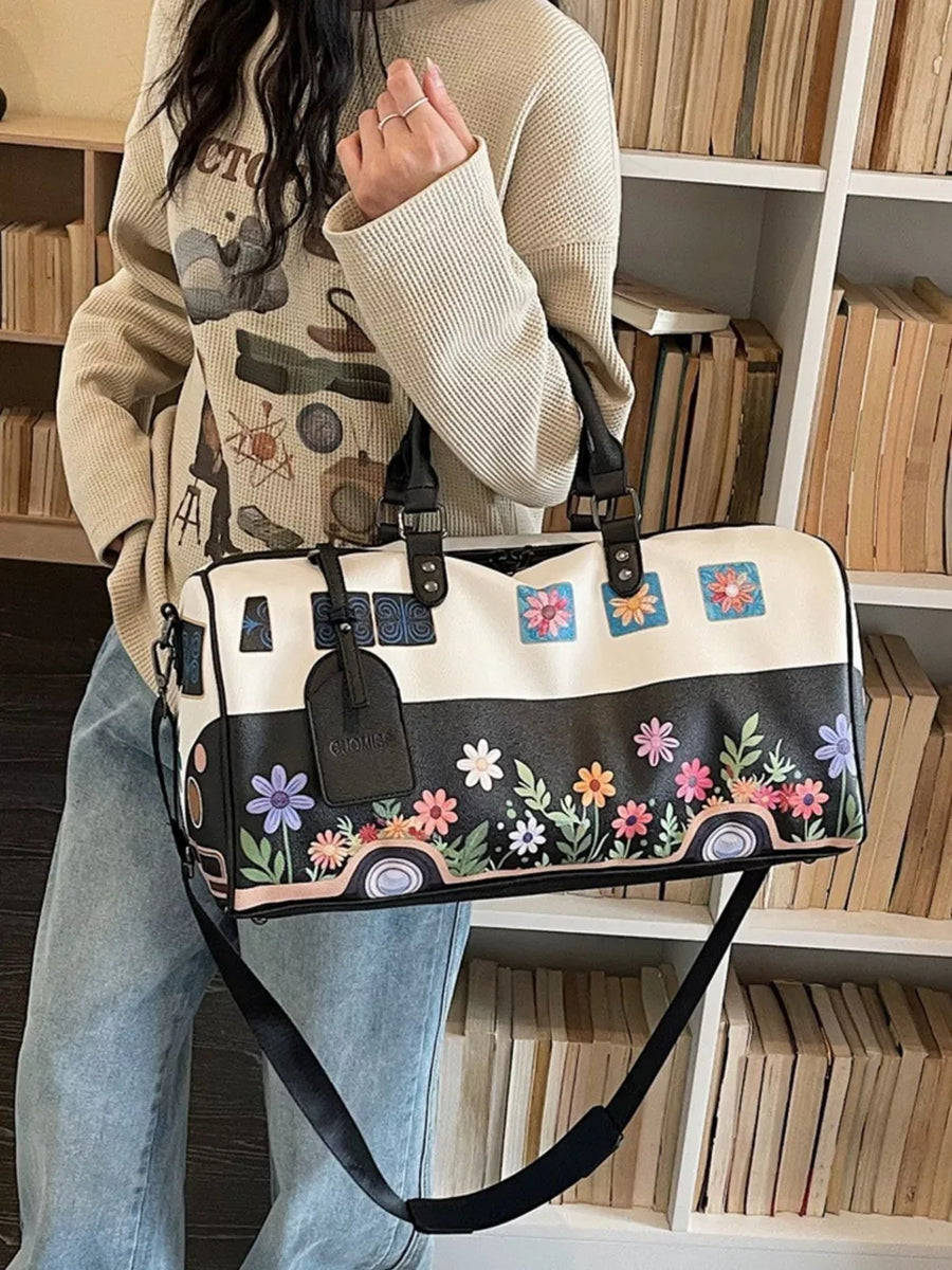 Flower Power Large Duffel Bag in black and white with colorful floral and camper van print.