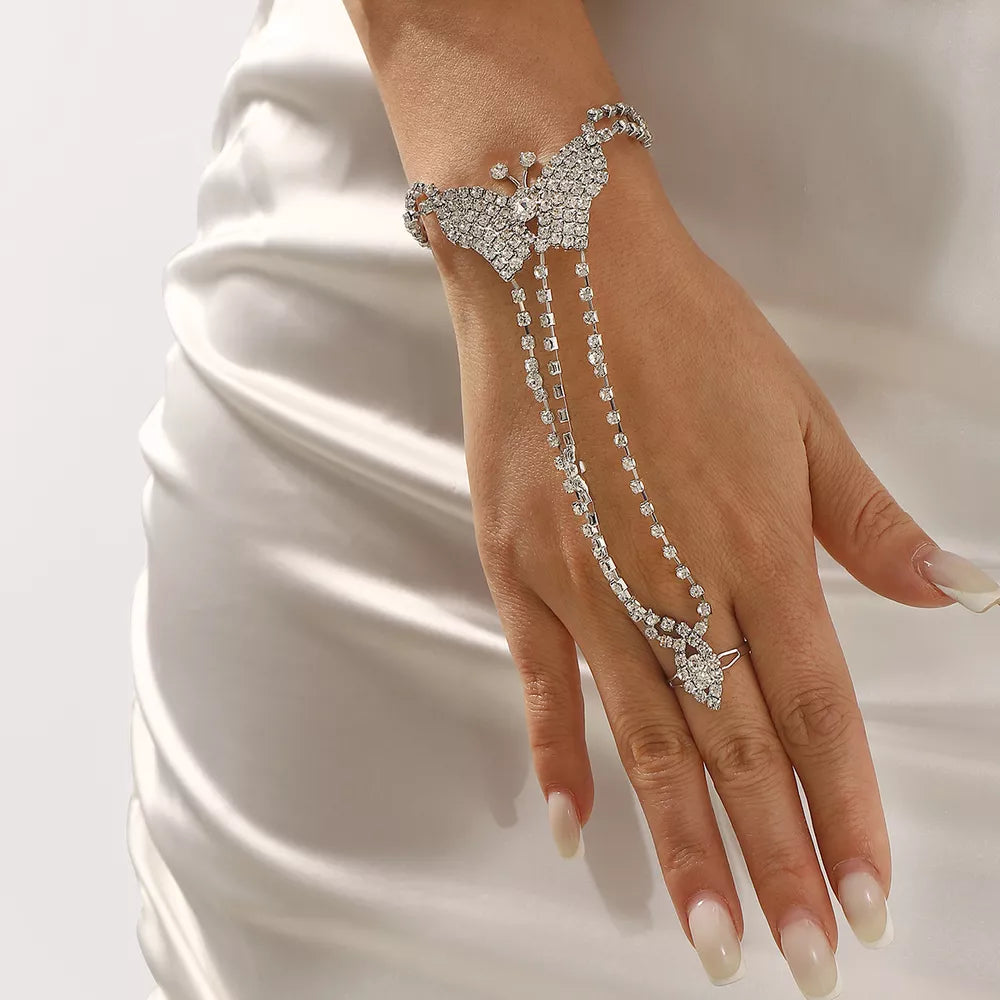 hand chain bracelet in silver featuring rhinestone embellishment and fitted fit