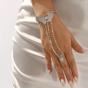 hand chain bracelet in silver featuring rhinestone embellishment and fitted fit