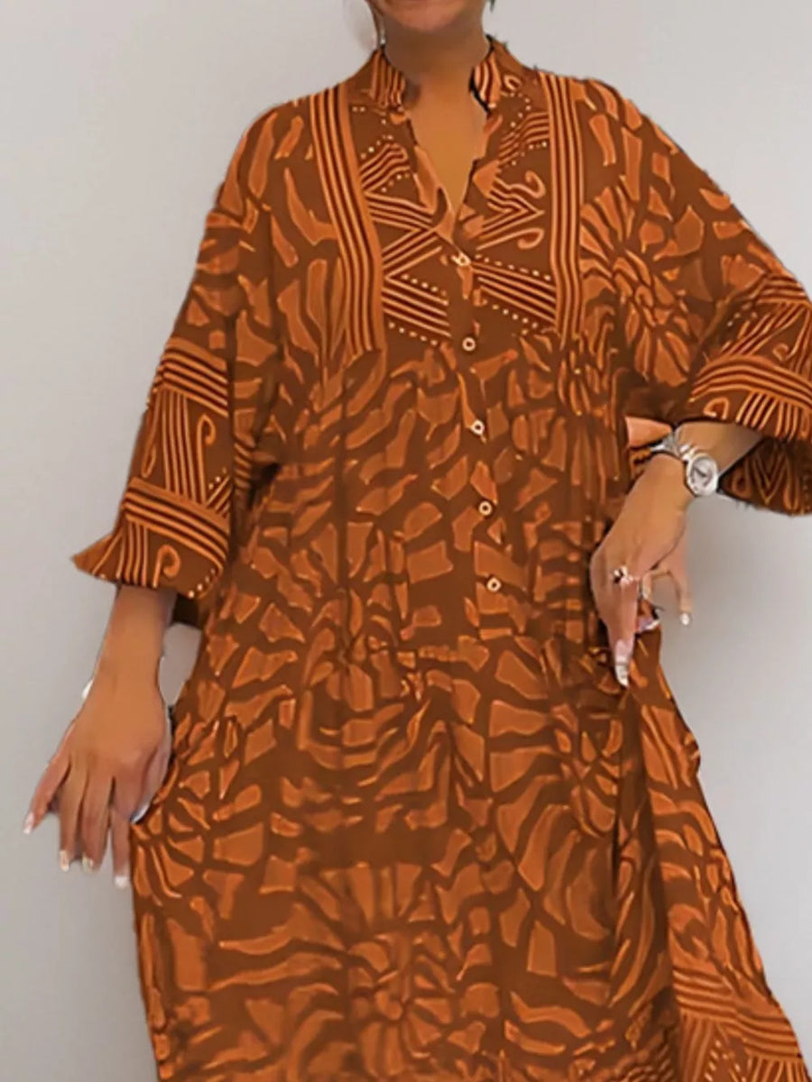 Brown abstract print midi dress with a V-neck and button front.