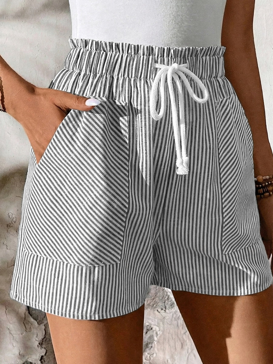 Striped cotton shorts with elastic drawstring waist and pockets.