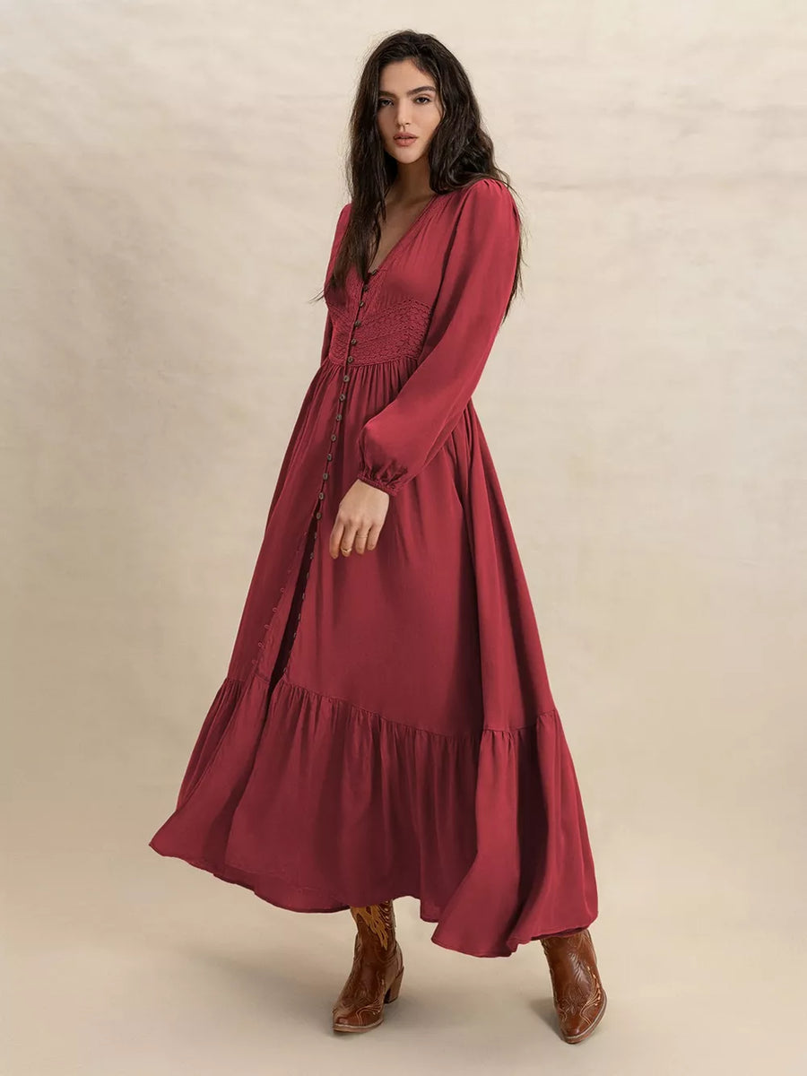 Burgundy plus-size maxi dress with balloon sleeves, button front, shirred bodice, and tiered ruffled hem.