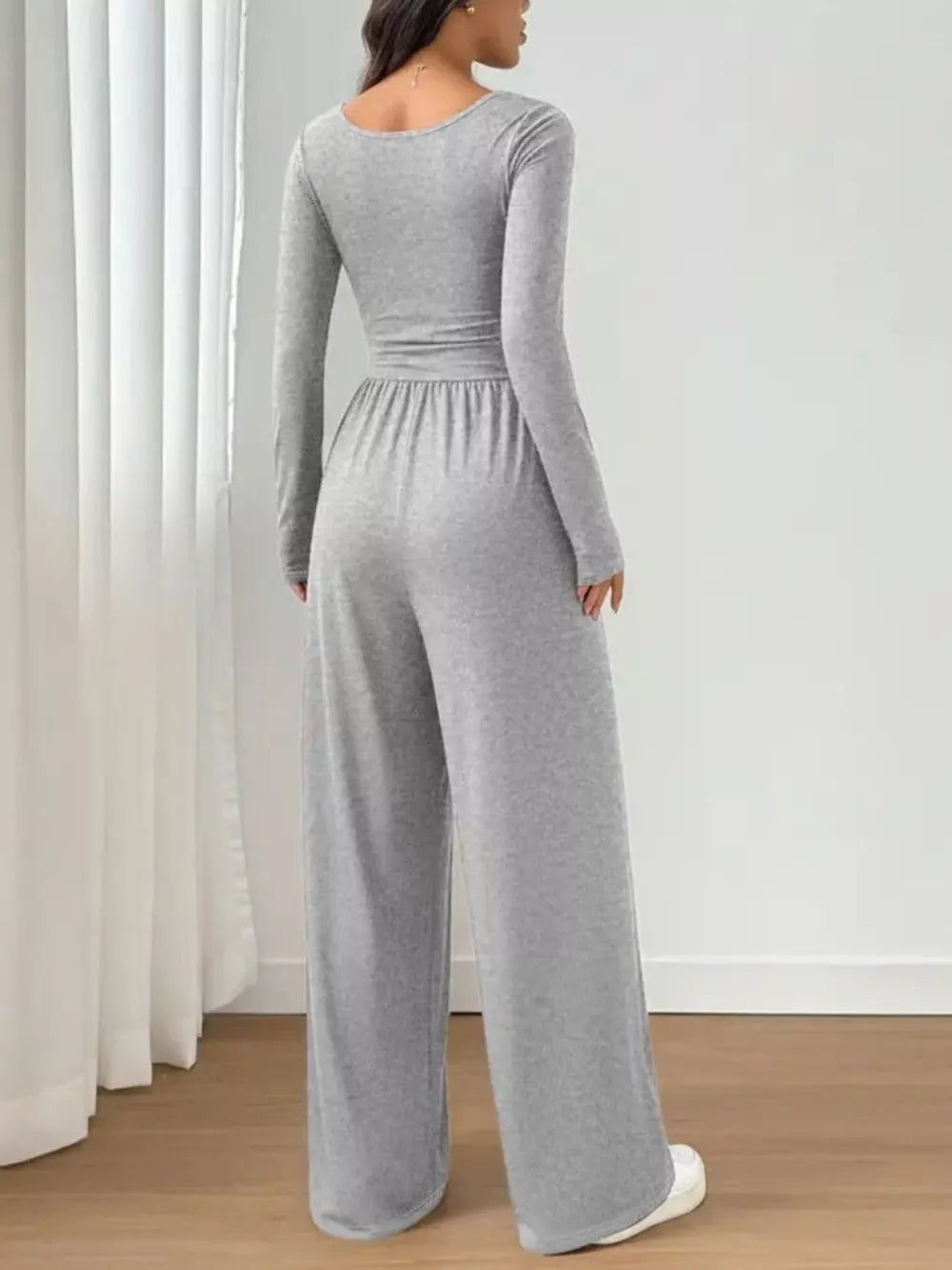 100% polyester Care instructions: Machine wash cold jumpsuit in Gray with wide-leg silhouette