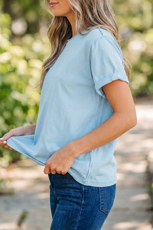Light blue cotton blend t-shirt with cuffed short sleeves and a round neck.