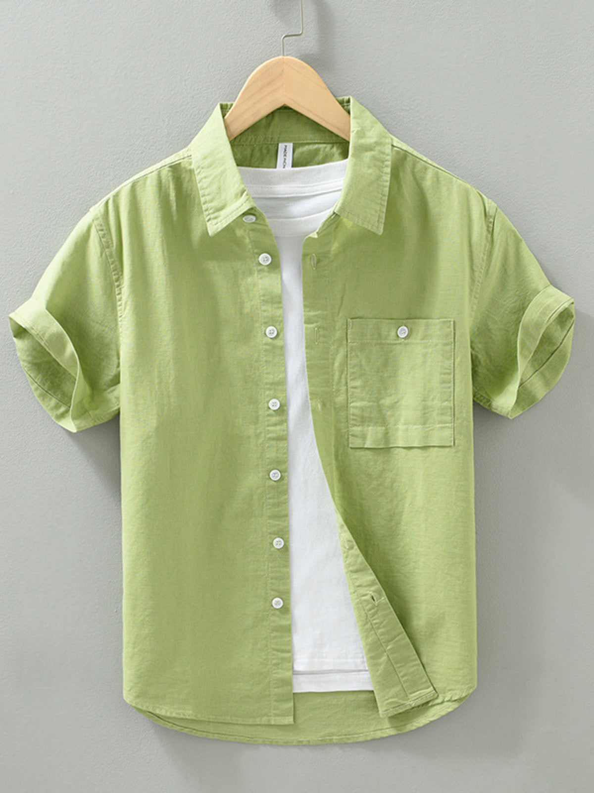 button-down shirt in lime green featuring chest pocket and regular fit