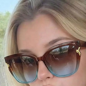 light blue sunglasses featuring UV protection and ombre