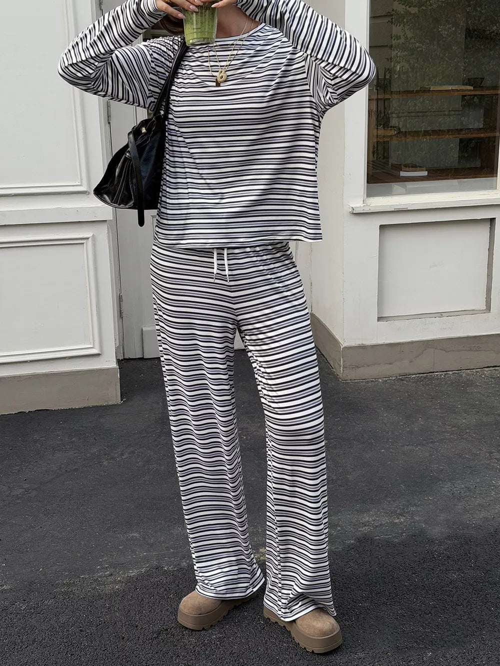95% polyester, 5% elastane Care instructions: Machine wash cold pajama set in Gray with relaxed silhouette
