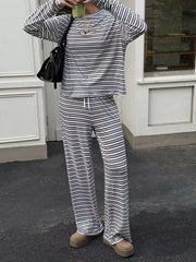 95% polyester, 5% elastane Care instructions: Machine wash cold pajama set in Gray with relaxed silhouette